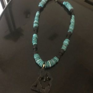 Turquoise and lava stones handmade necklace.